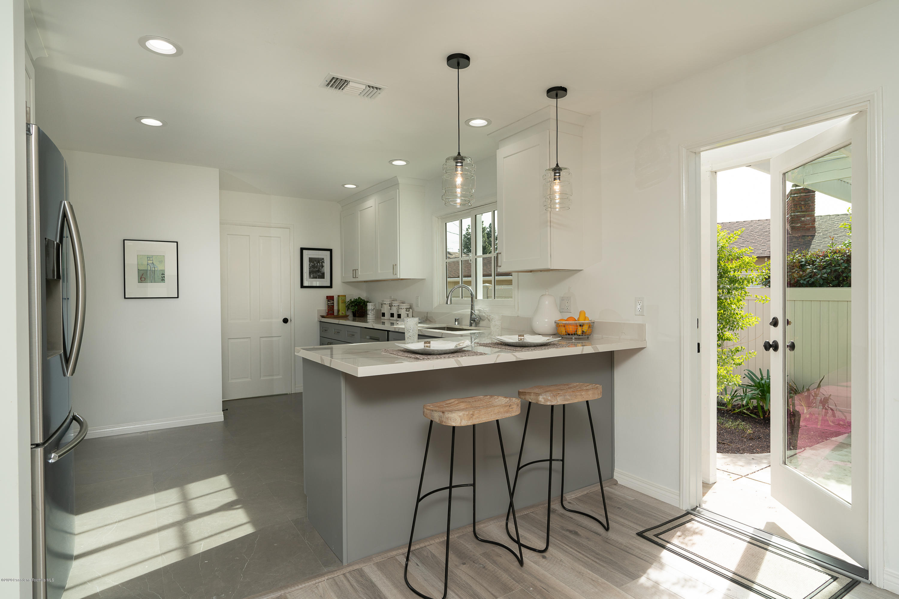 3248 George Circle Pasadena, CA 91107 - Photo 15 of 34 a bathroom with a tub sink and mirror
