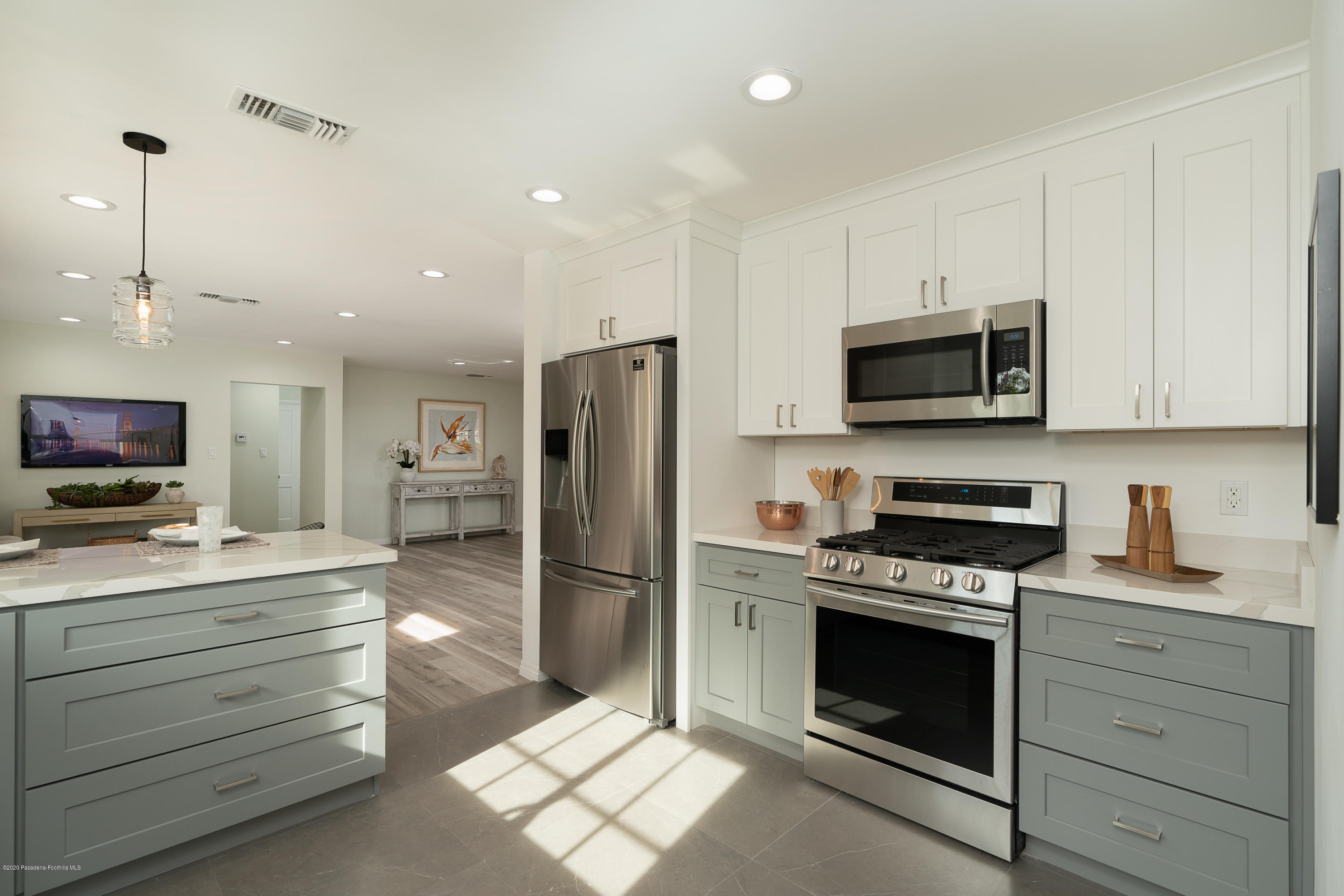 3248 George Circle Pasadena, CA 91107 - Photo 18 of 34 a kitchen with a sink stove and refrigerator