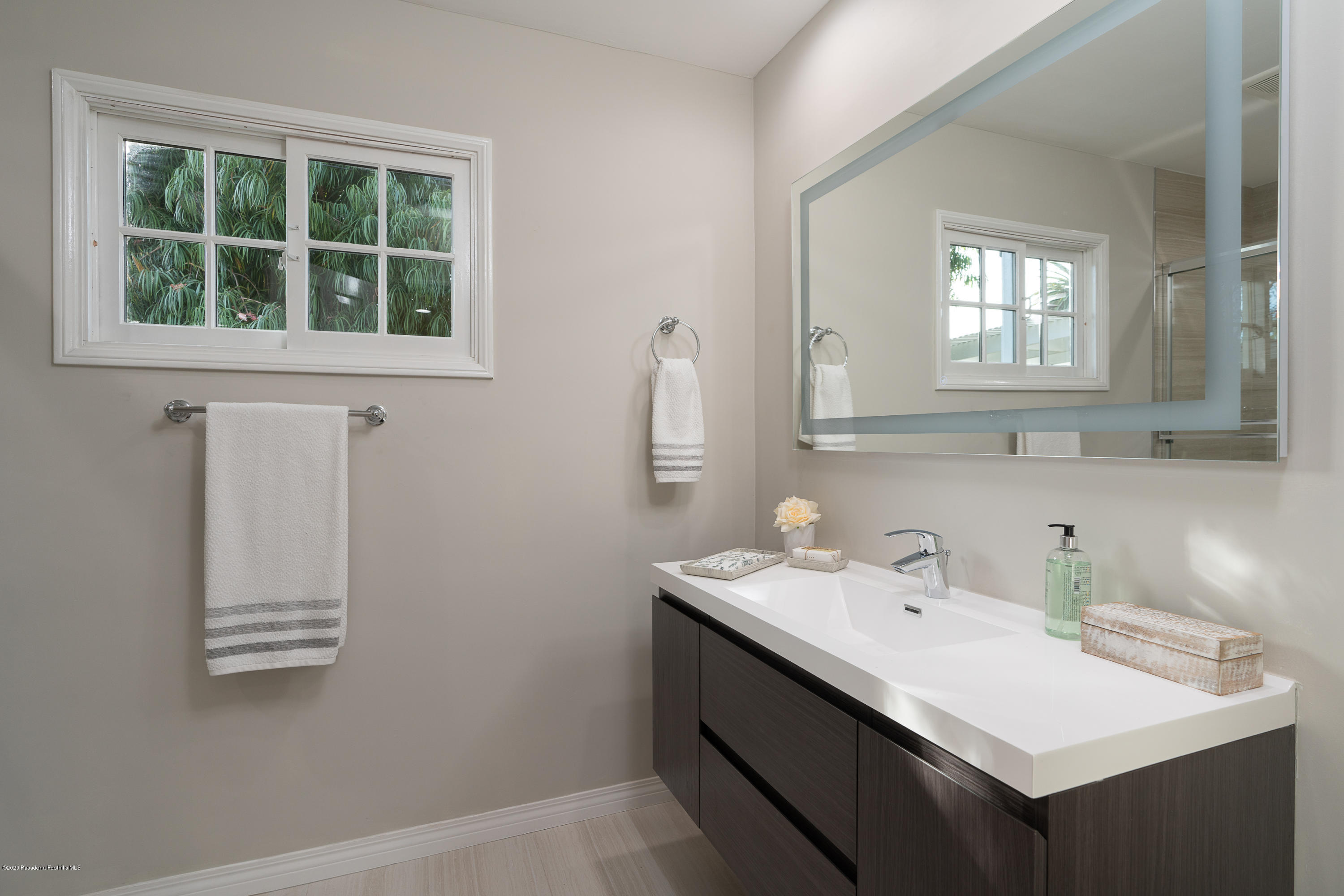 3248 George Circle Pasadena, CA 91107 - Photo 23 of 34 a bathroom with a sink and a window