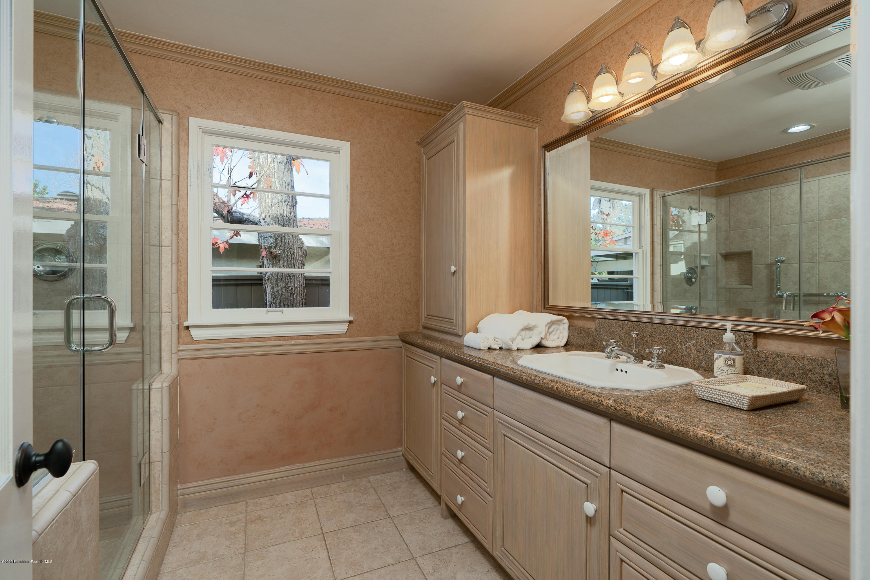 3248 George Circle Pasadena, CA 91107 - Photo 27 of 34 a bathroom with a granite countertop sink mirror and double