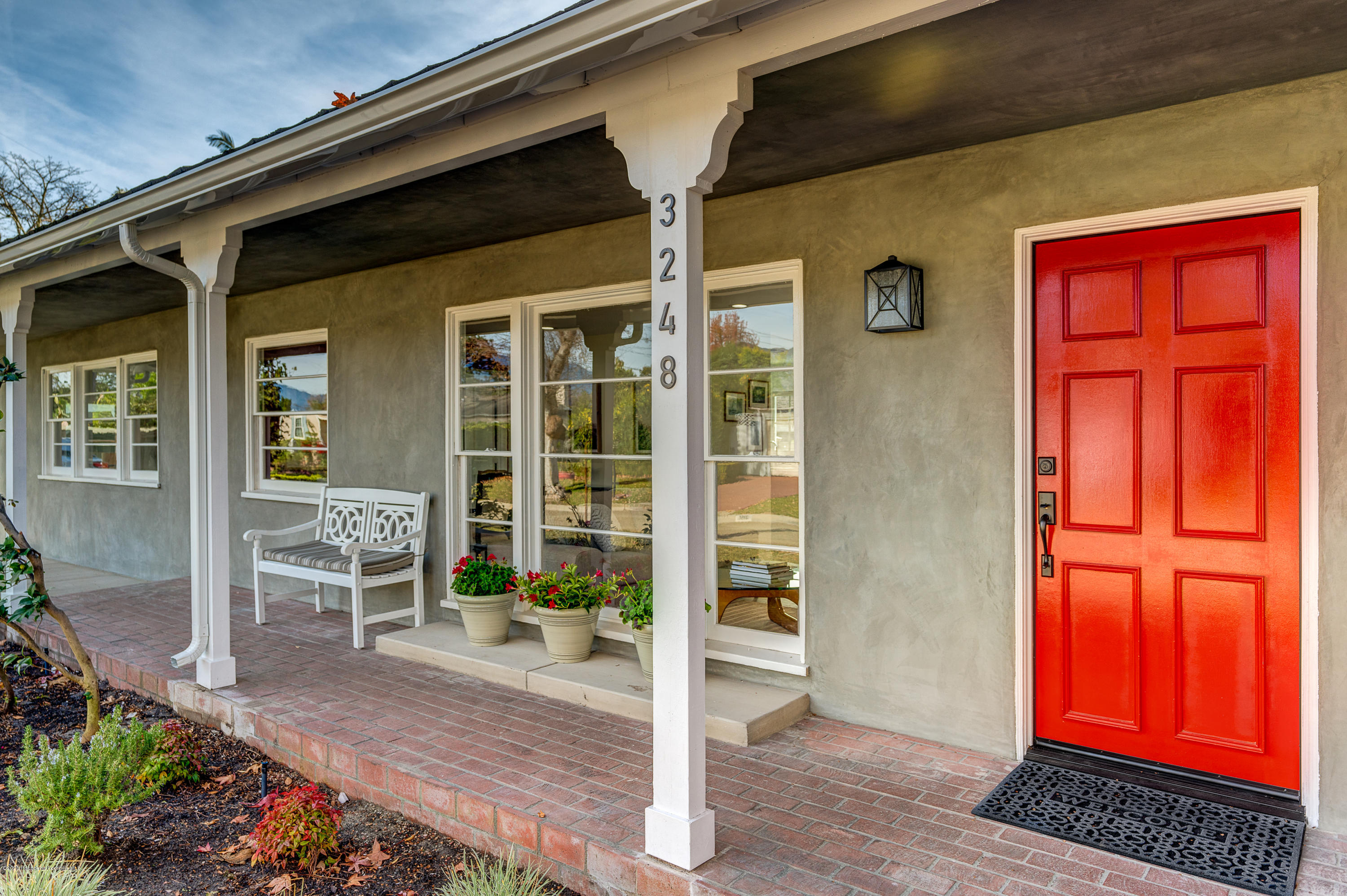 3248 George Circle Pasadena, CA 91107 - Photo 4 of 34 a front view of a house with outdoor seating