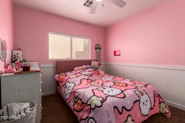 a bathroom with a sink and a mirror with toilet