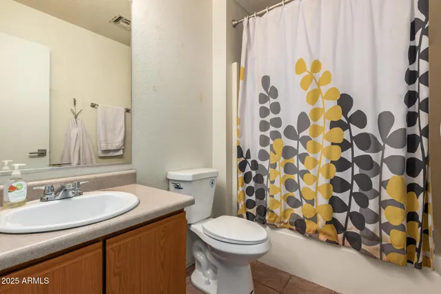 a view of backyard with barbeque grill and stairs