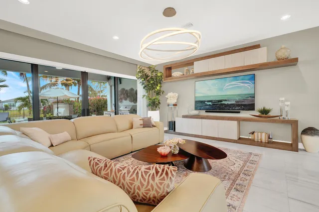 a kitchen with white cabinets and appliances