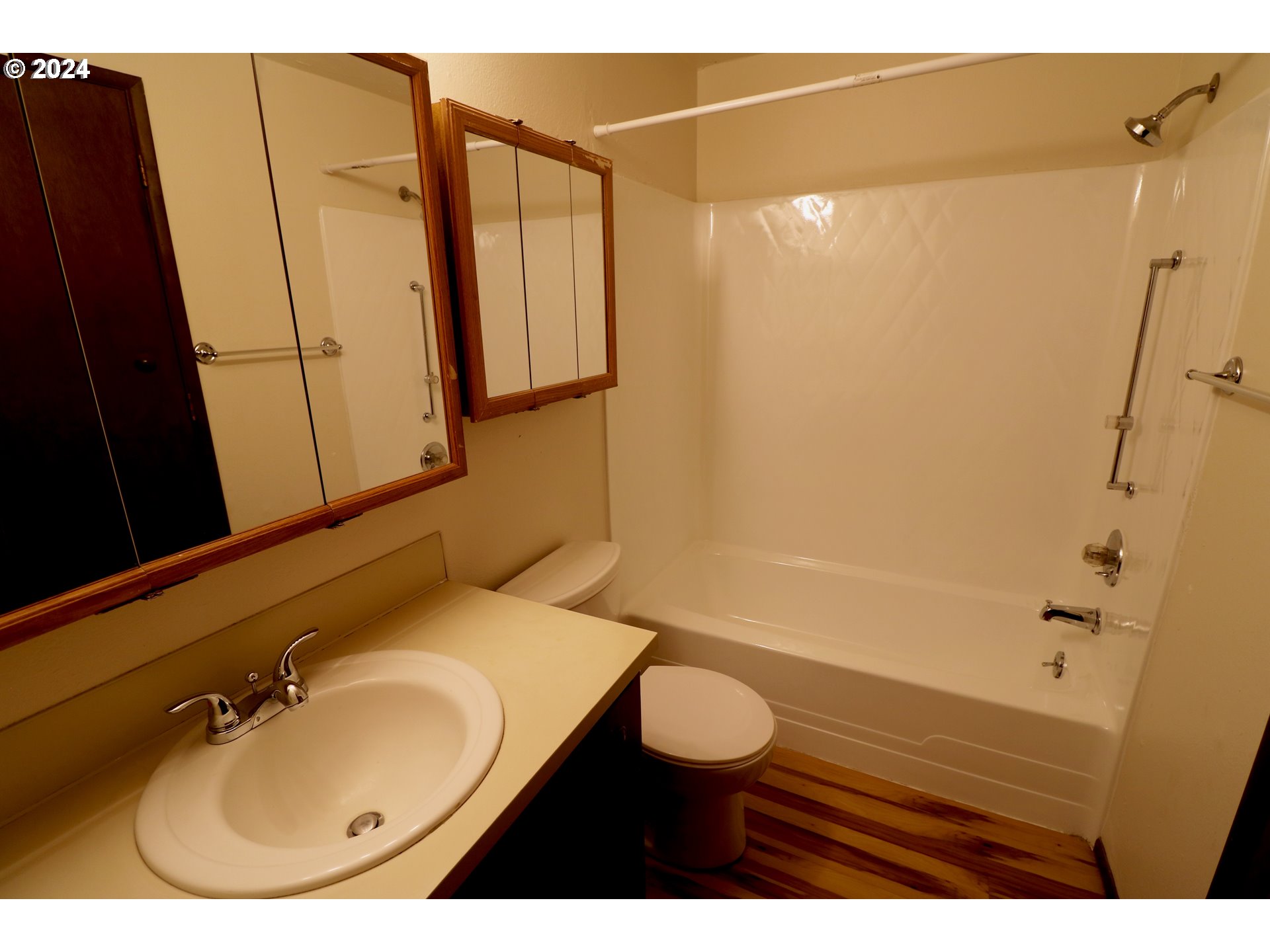 260 54th Street Springfield, OR 97478 - Photo 3 of 9 a bathroom with a sink toilet and shower
