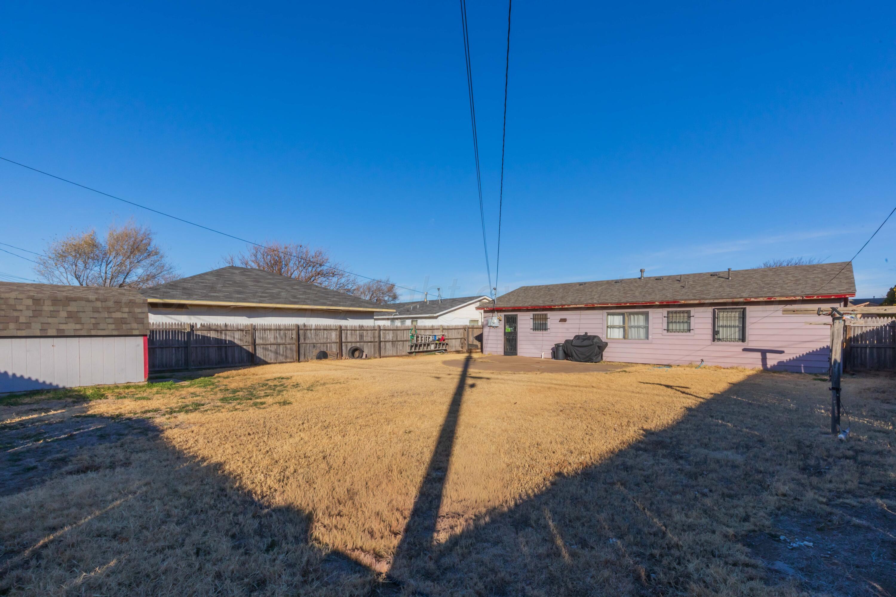 1208 Pecan Street Amarillo, TX 79107 - Photo 33 of 34 a view of a house with pool and sitting area