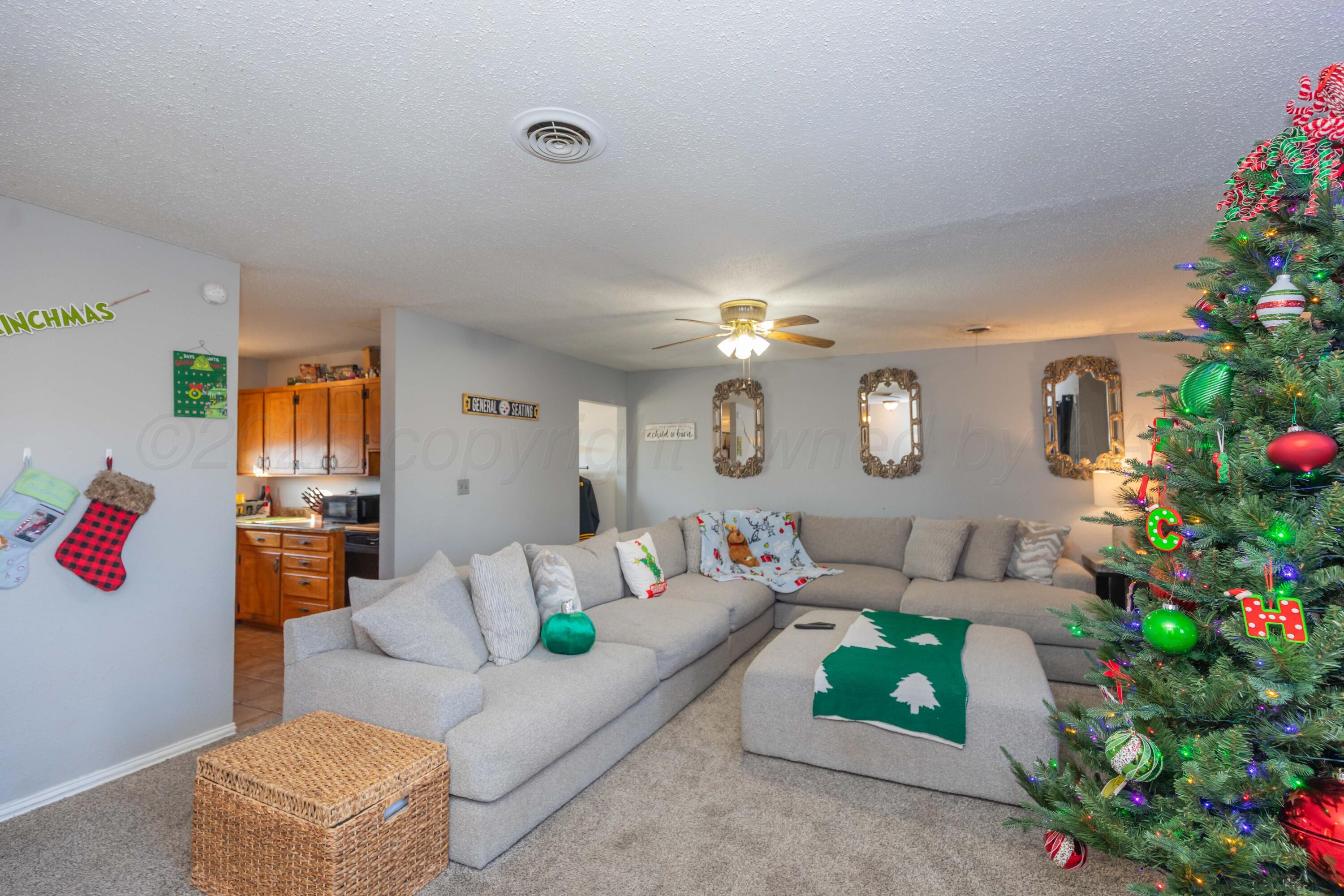 1208 Pecan Street Amarillo, TX 79107 - Photo 5 of 34 a living room with furniture and flowers
