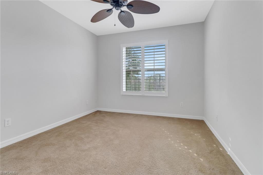 20000 Heatherstone Way, Unit 3 Estero, FL 33928 - Photo 23 of 44 an empty room with a window