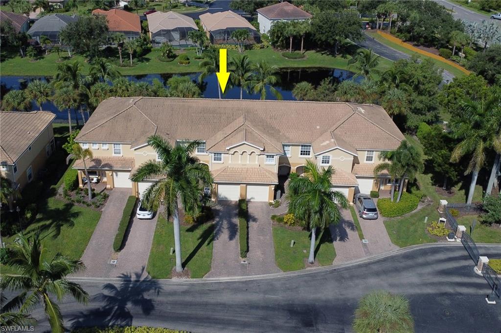 20000 Heatherstone Way, Unit 3 Estero, FL 33928 - Photo 32 of 44 an aerial view of house with yard