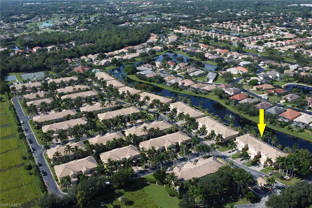 20000 Heatherstone Way, Unit 3 Estero, FL 33928 - Photo 33 of 44 an aerial view of a city with lots of residential buildings