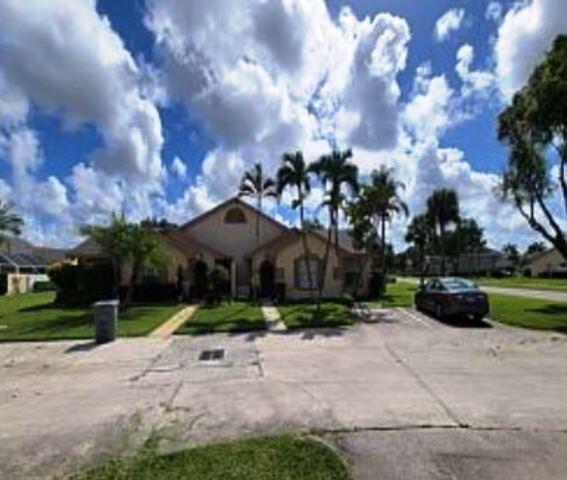 9407 Boca Gardens Parkway, Unit D Boca Raton, FL 33496 - Photo 1 of 1 Front