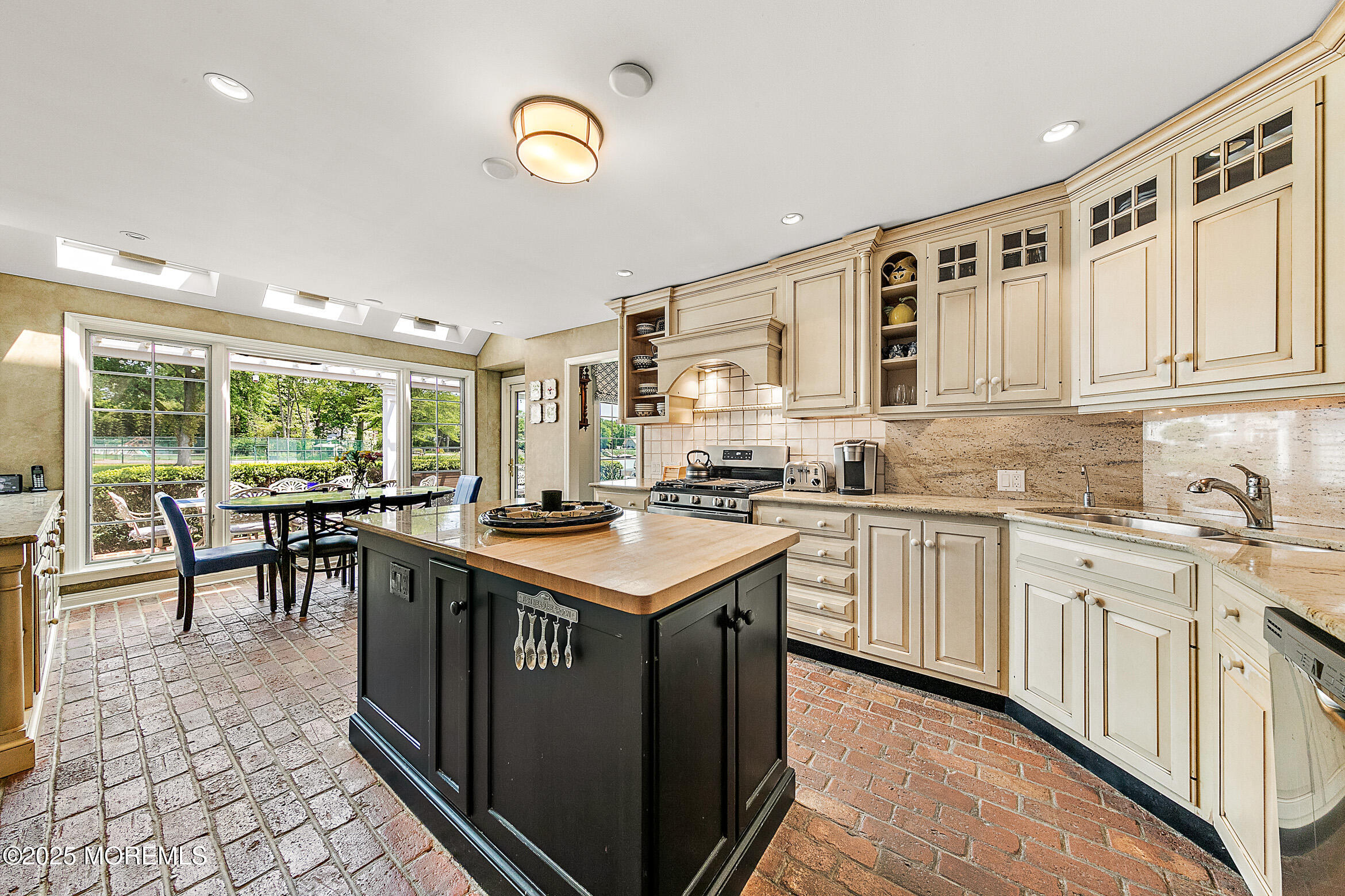 45 Wardell Avenue Rumson, NJ 07760 - Photo 12 of 57 a kitchen with sink cabinets and stove top oven
