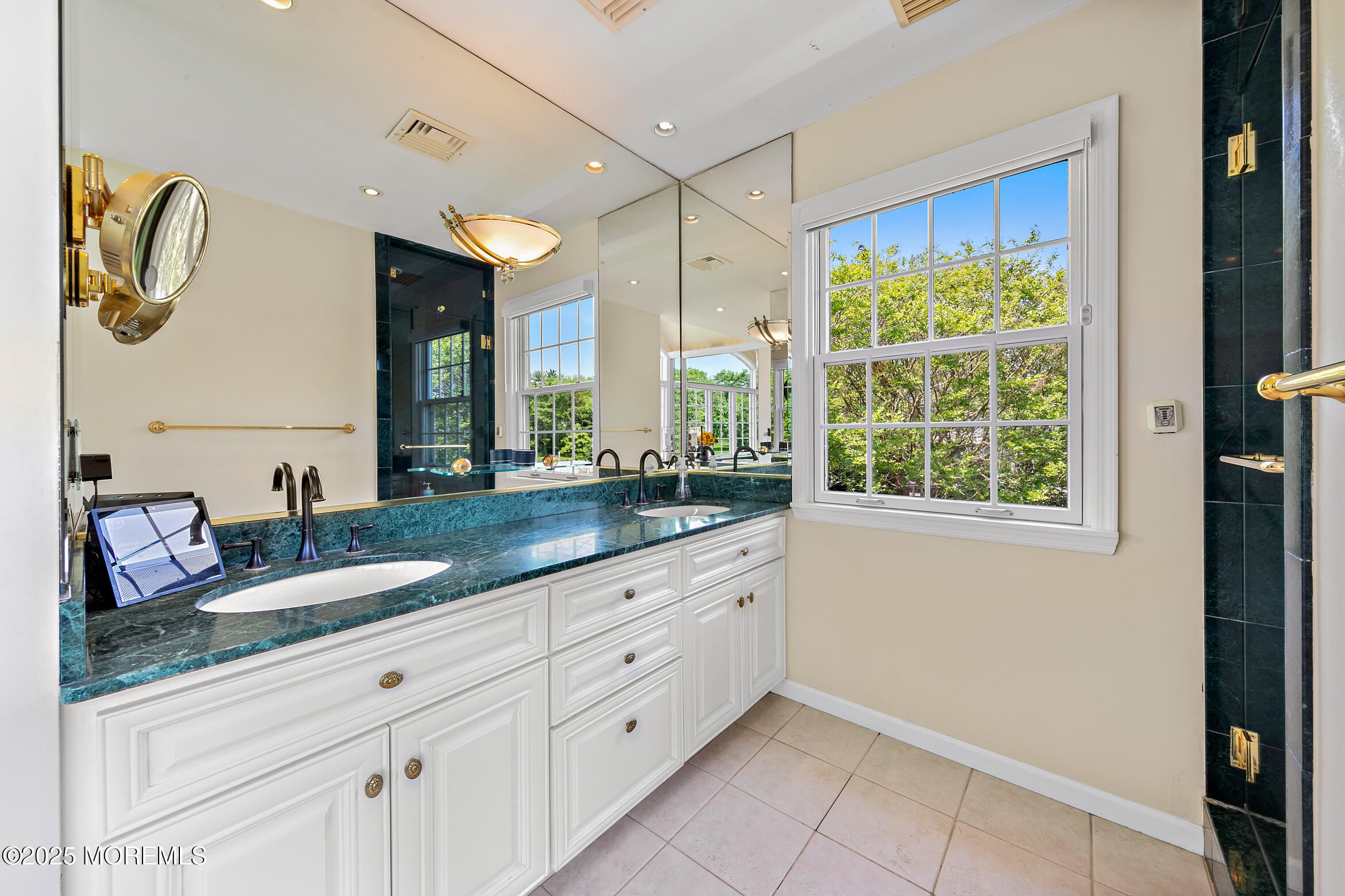 45 Wardell Avenue Rumson, NJ 07760 - Photo 24 of 57 a bathroom with a granite countertop sink and a mirror
