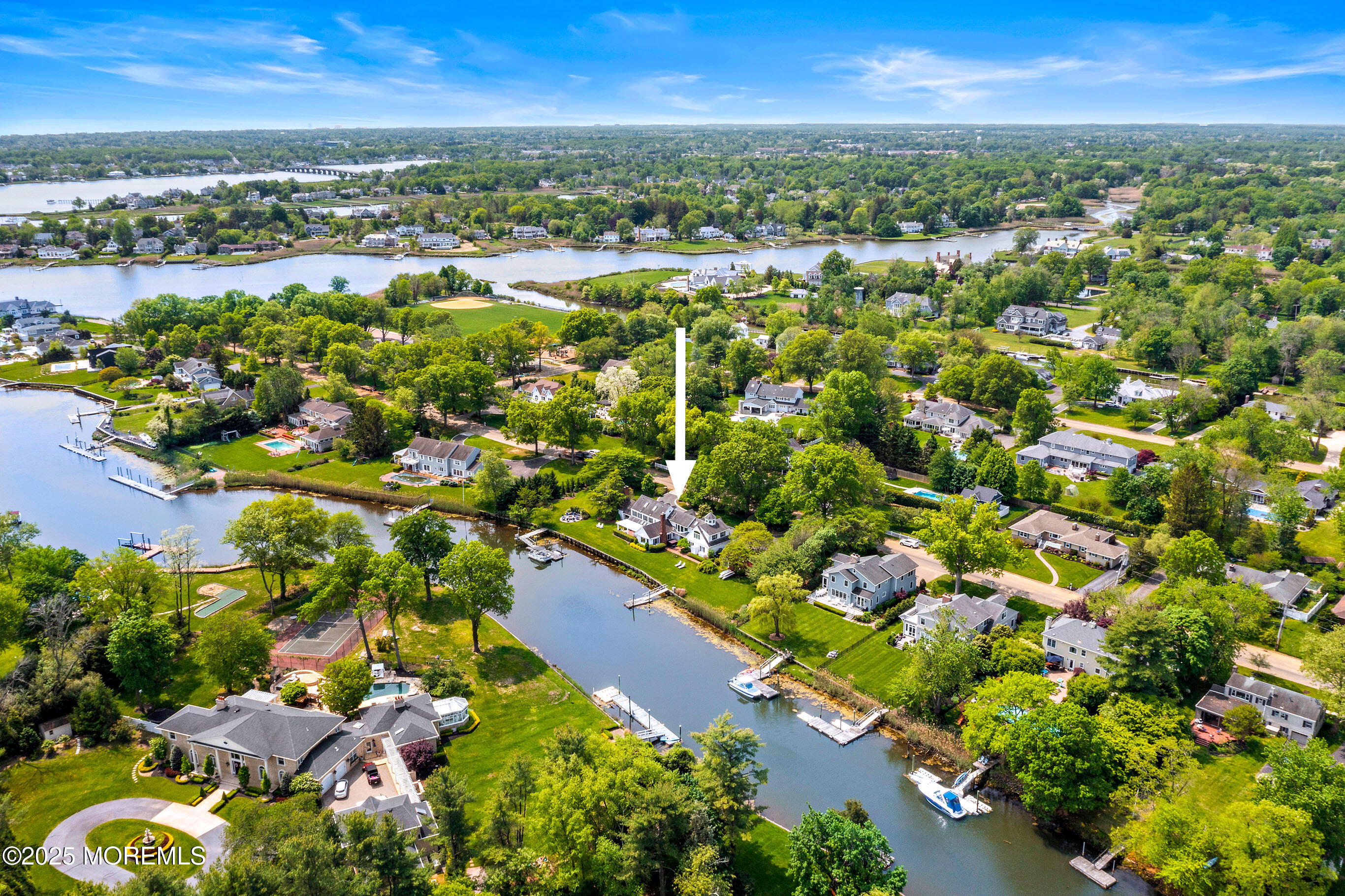 45 Wardell Avenue Rumson, NJ 07760 - Photo 44 of 57 an aerial view of residential houses with outdoor space and trees