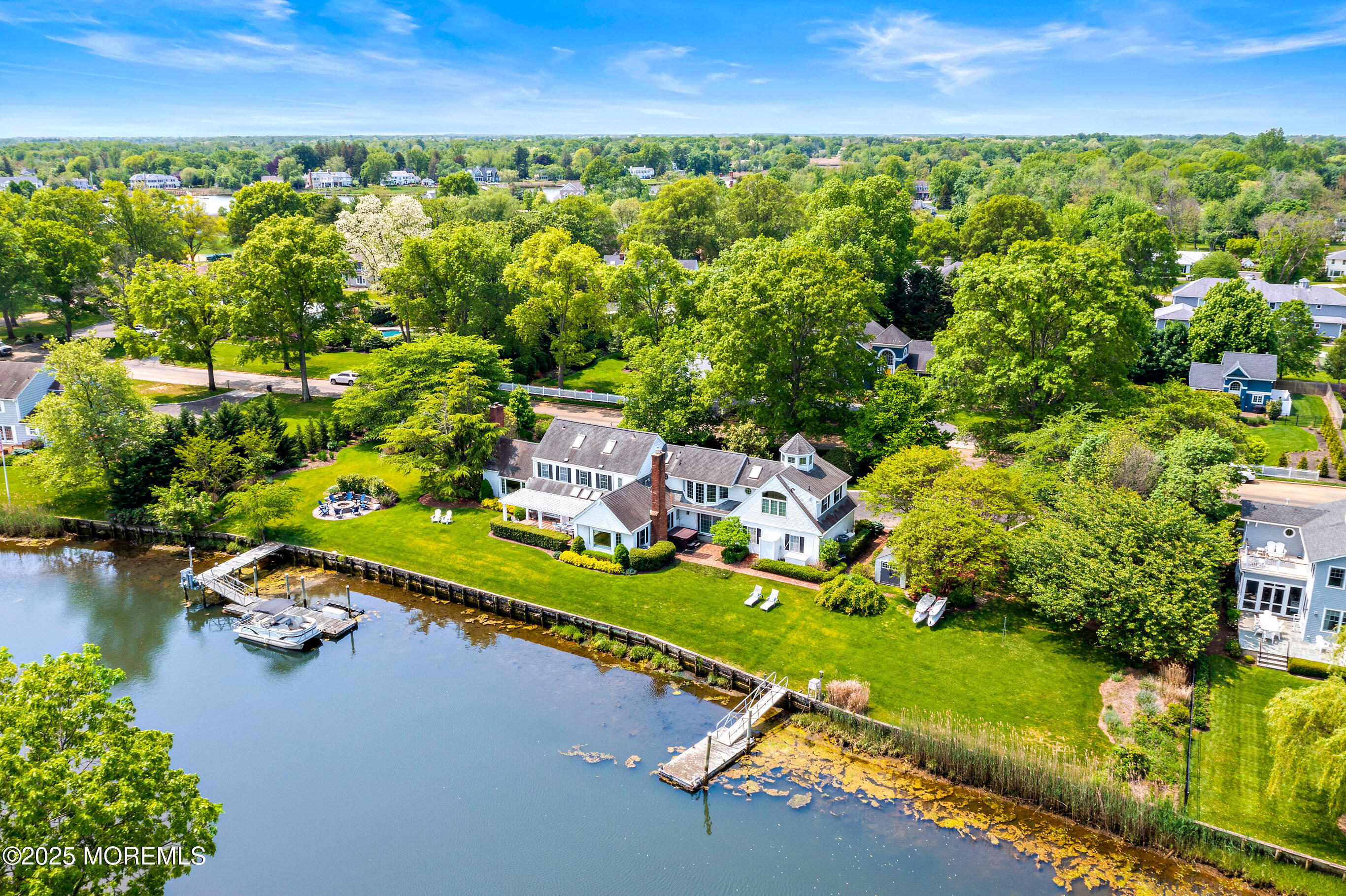 45 Wardell Avenue Rumson, NJ 07760 - Photo 56 of 57 an aerial view of a house with a garden and lake view