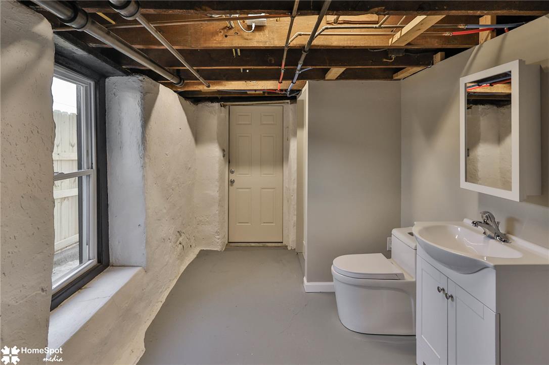 619 Sioux Street Bethlehem, PA 18015 - Photo 44 of 61 a bathroom with a sink a toilet and shower