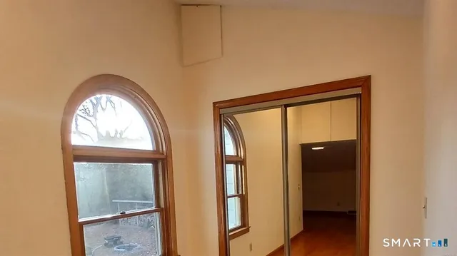 a view of front door with hallway