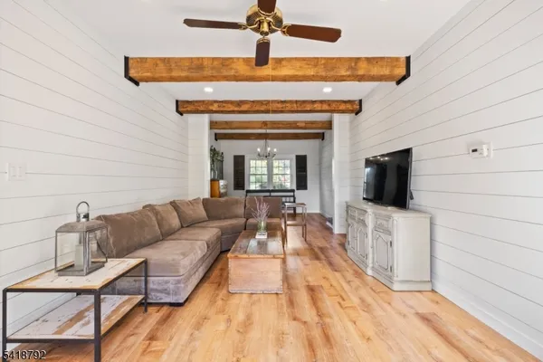 a bathroom with a double vanity sink a mirror and a shower