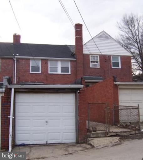 922 North Hill Road Baltimore, MD 21218 - Photo 14 of 14 a view of a brick house with large windows