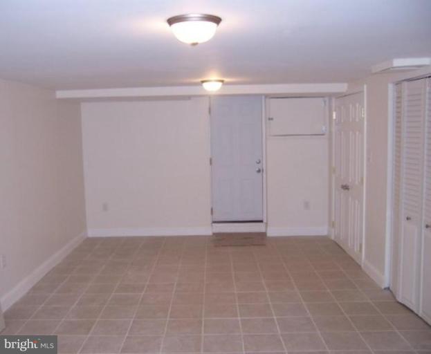 922 North Hill Road Baltimore, MD 21218 - Photo 8 of 14 a view of an empty room