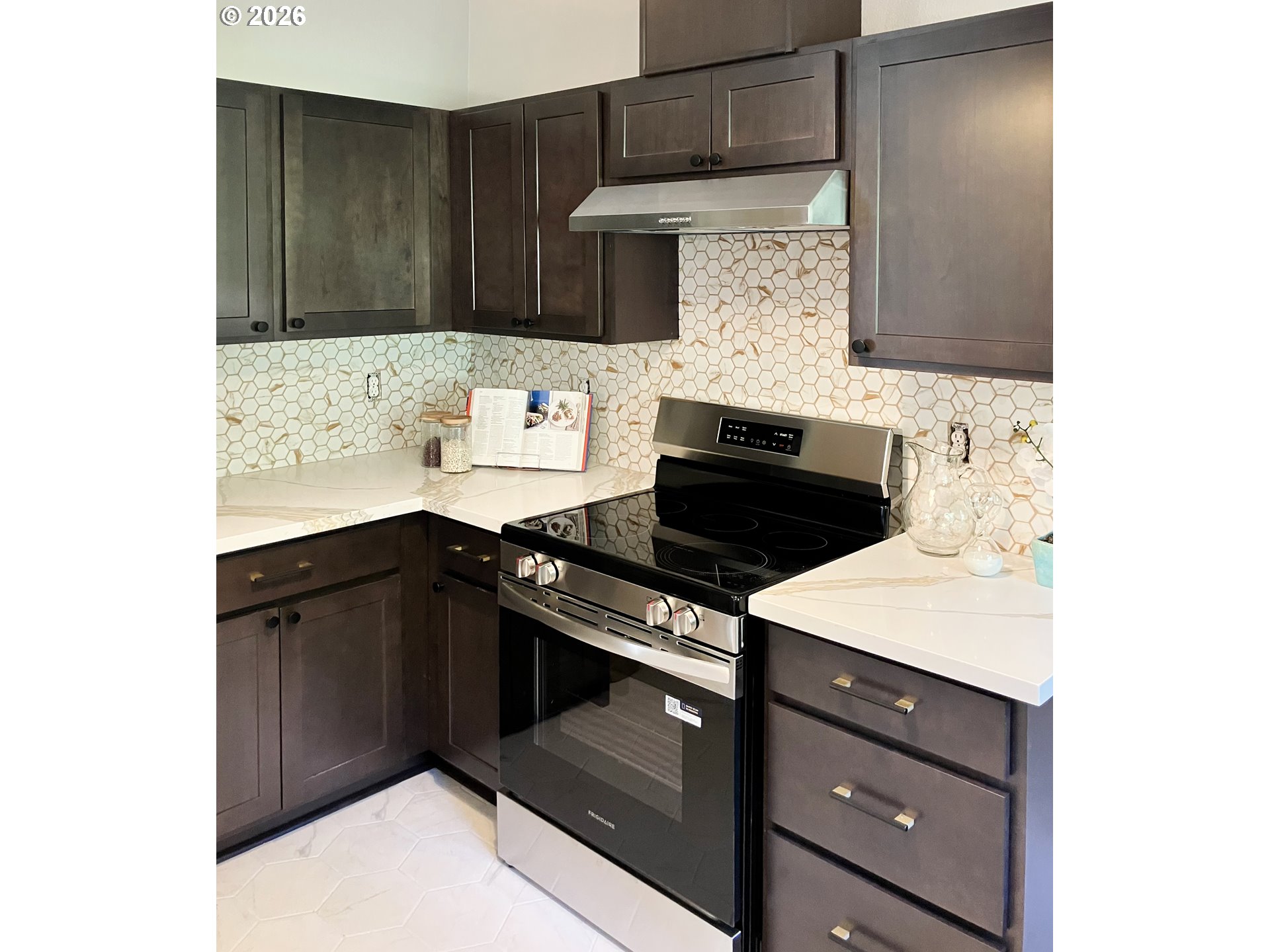 650 Marvin Road Tillamook, OR 97141 - Photo 19 of 48 a kitchen with a sink and cabinets