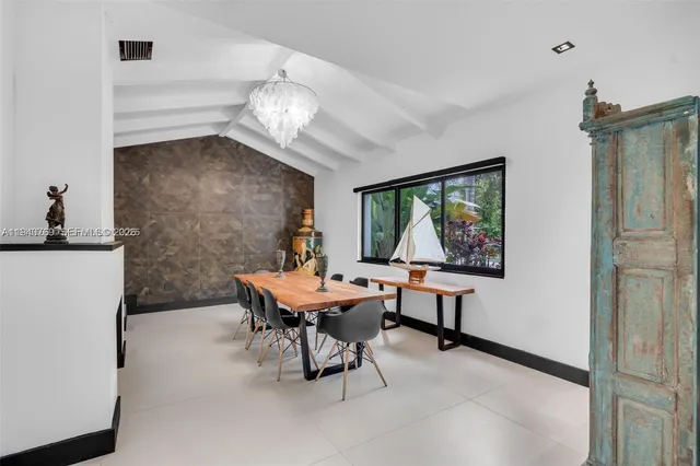 a workspace with furniture and a window