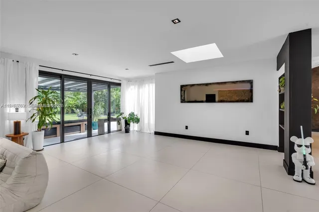 a view of a livingroom with a large window