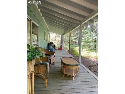 64 Northwoods Cougar, WA 98616 - Photo 12 of 22 a living room with furniture and a floor to ceiling window