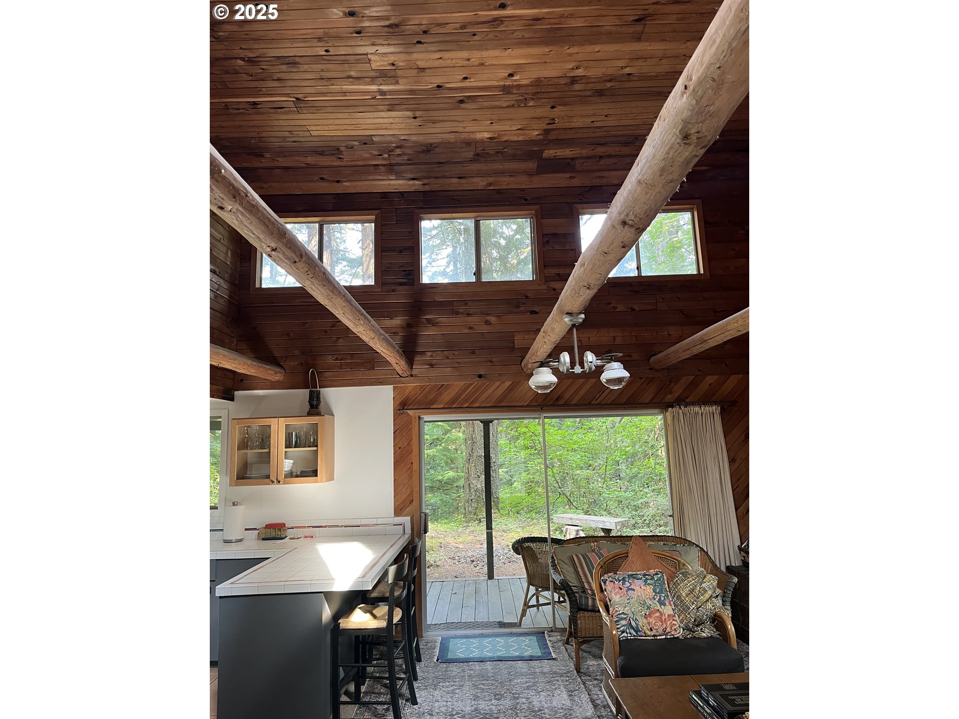 64 Northwoods Cougar, WA 98616 - Photo 22 of 22 a dining room with furniture and a floor to ceiling window