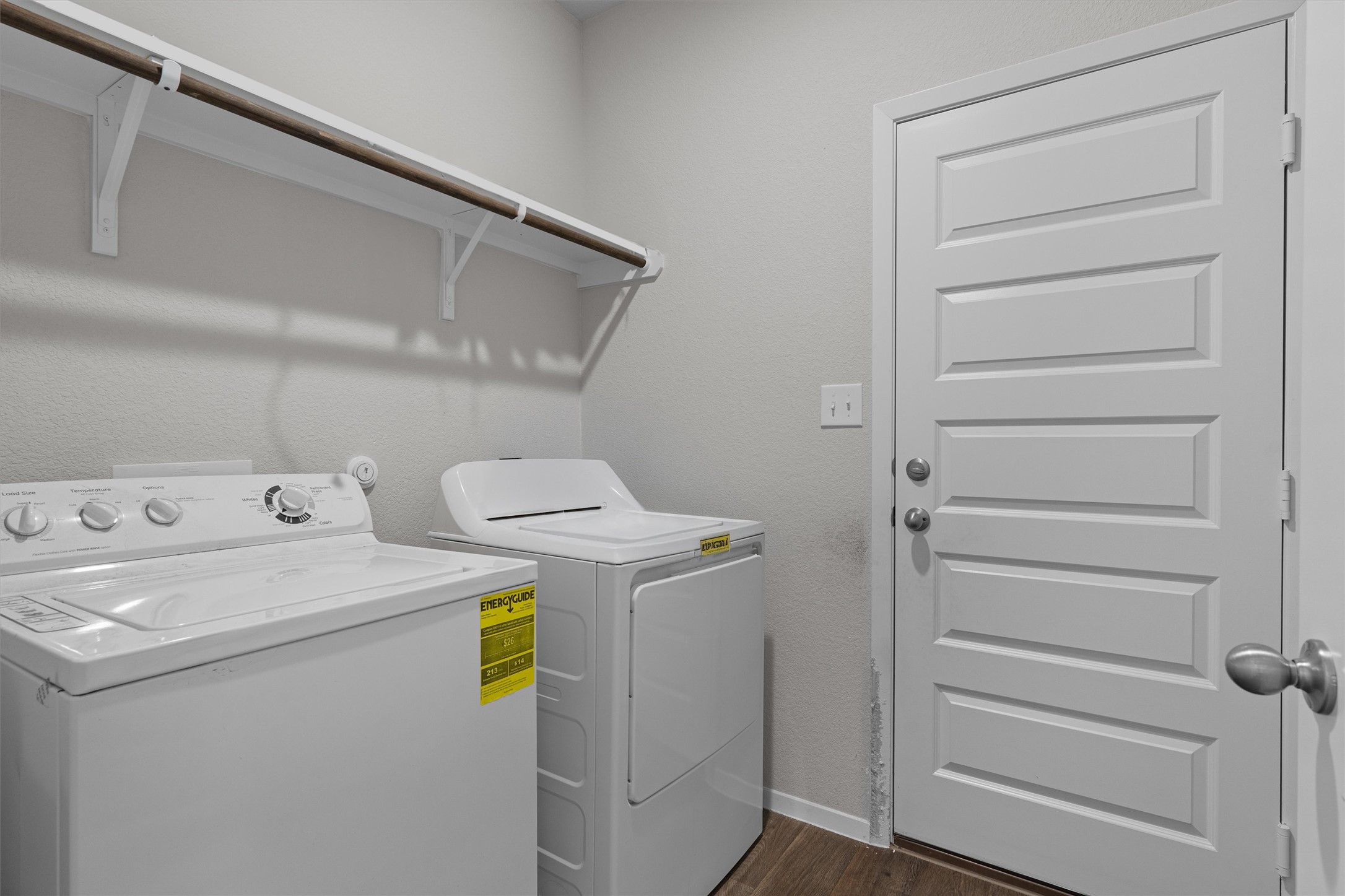 2606 Totley Road Manor, TX 78653 - Photo 19 of 28 a utility room with dryer and washer