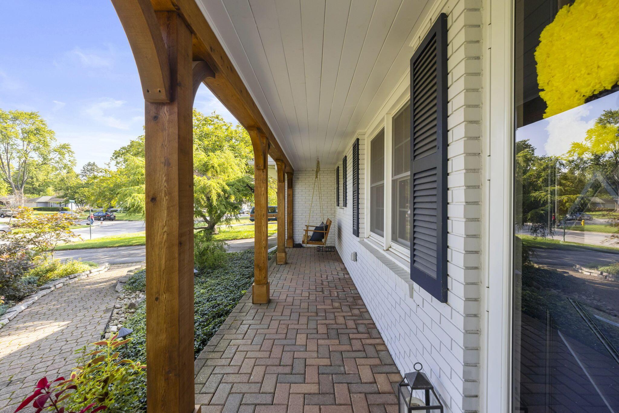 1561 Kirkley Road Columbus, OH 43221 - Photo 57 of 92 The current owner has refreshed the front covered porch with newer ceiling, columns, paint & more