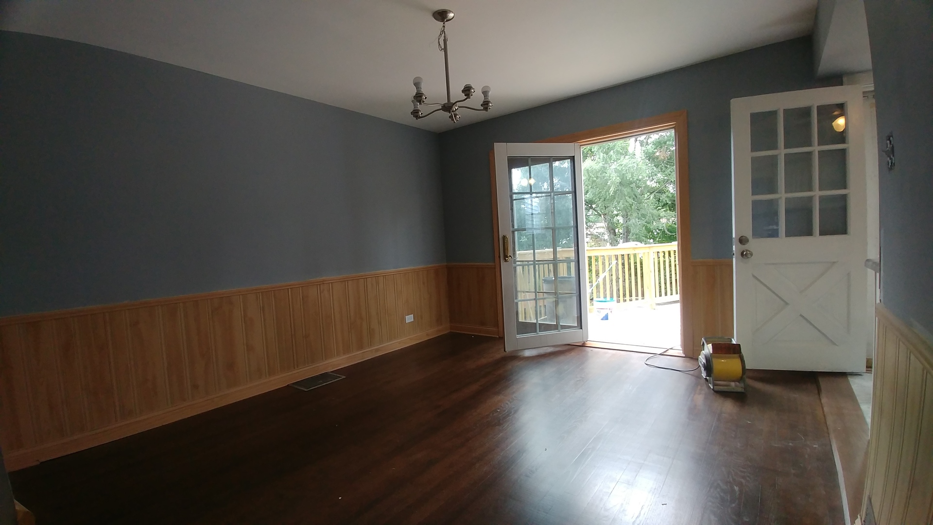202 7th Place Chicago Heights, IL 60411 - Photo 3 of 11 a view of an empty room with wooden floor and a window