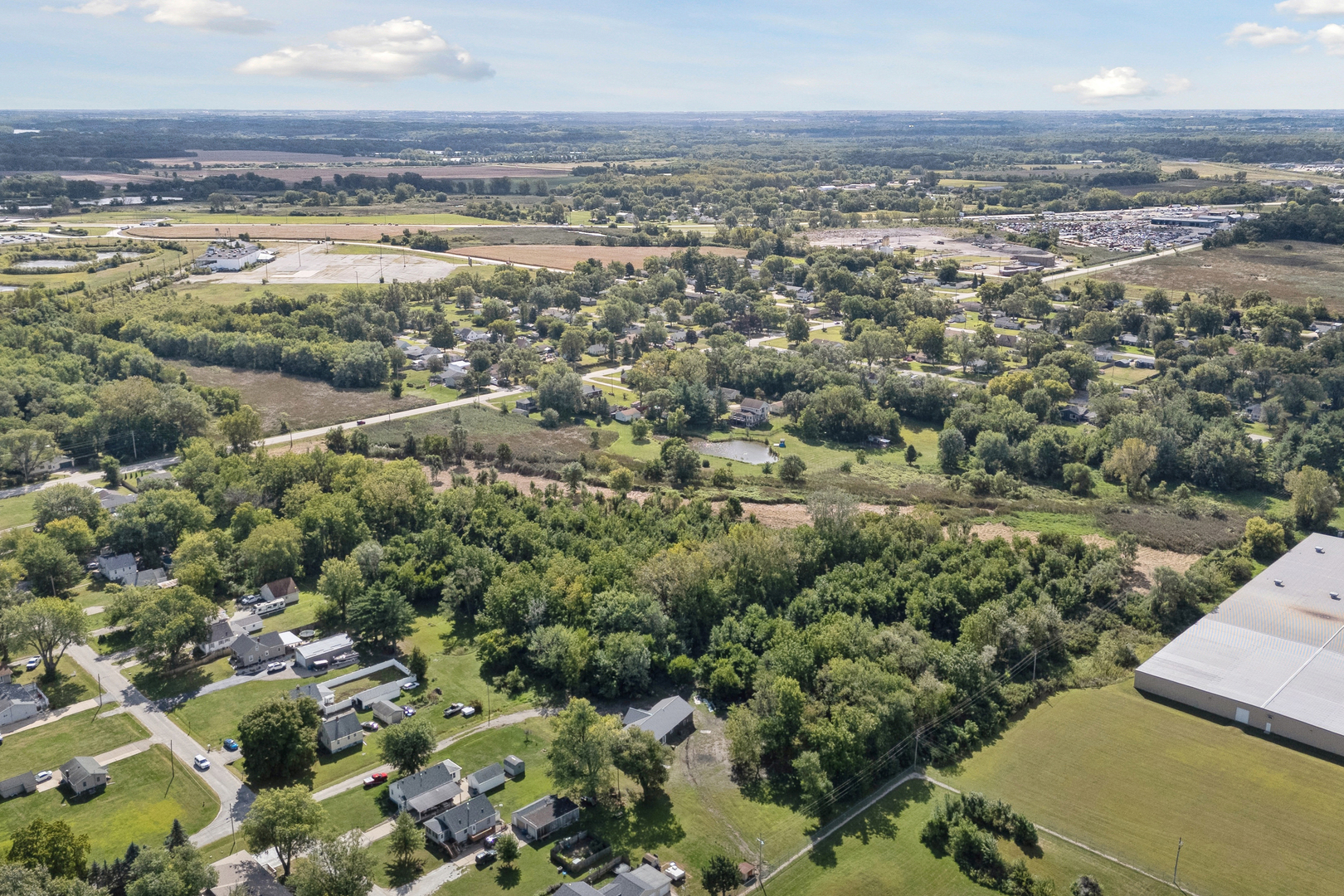 206 40th Street East Moline, IL 61244 - Photo 4 of 10 an aerial view of residential houses with outdoor space