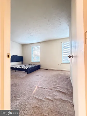 a view of room and front door