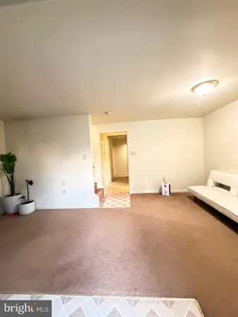 a view of a livingroom with furniture and a couch