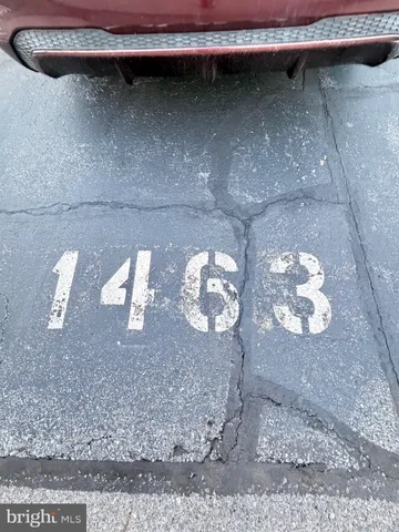 a view of street with parked cars