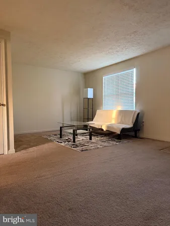 a room with furniture and window