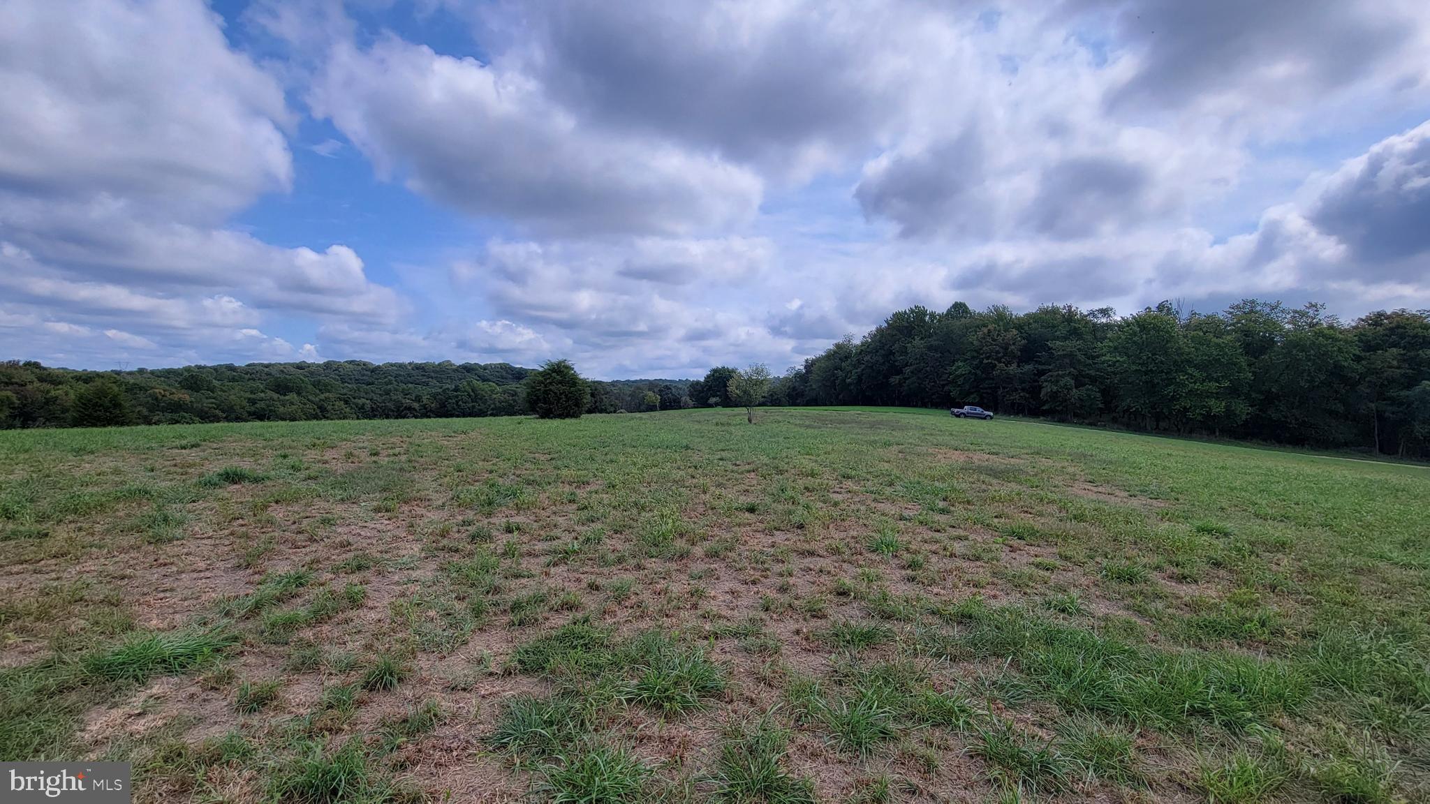5311 Woodville Road Mount Airy, MD 21771 - Photo 23 of 27 a view of a field with a city view