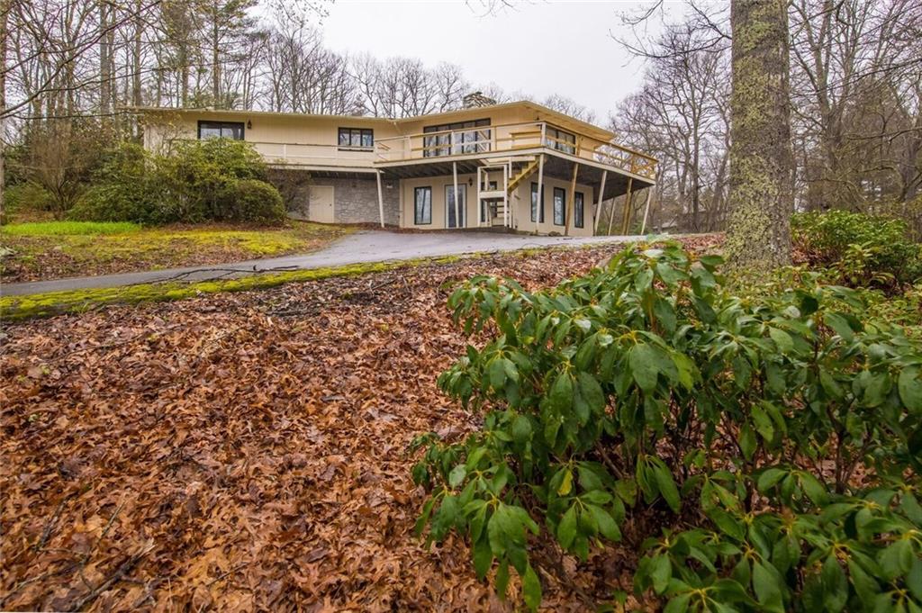 288 Rockledge Road Spruce Pine, NC 28777 - Photo 1 of 27 a view of a house with a yard