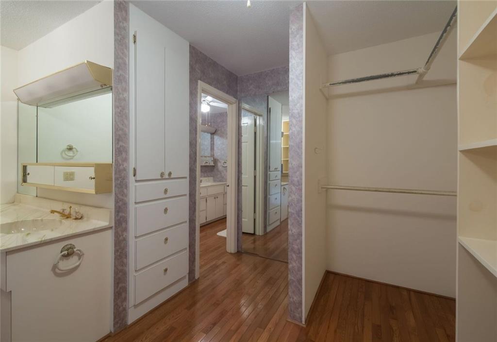 288 Rockledge Road Spruce Pine, NC 28777 - Photo 12 of 27 a bathroom with a sink a mirror and shower