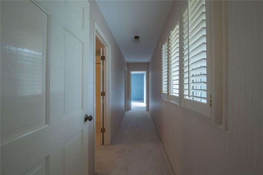 288 Rockledge Road Spruce Pine, NC 28777 - Photo 13 of 27 a view of a hallway with windows