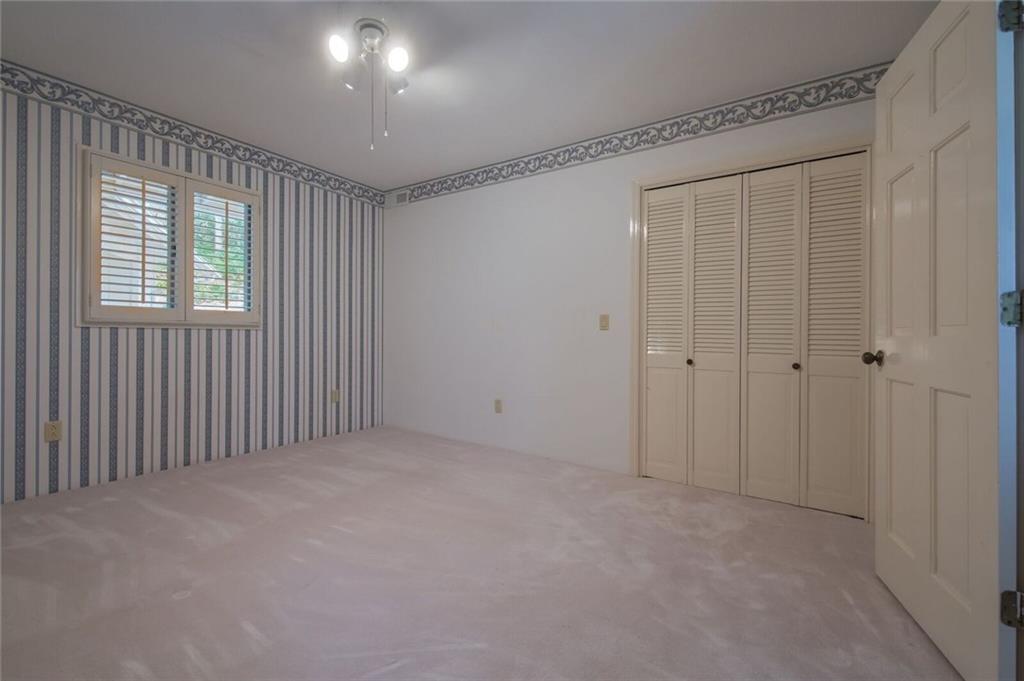 288 Rockledge Road Spruce Pine, NC 28777 - Photo 14 of 27 a view of an empty room and a window
