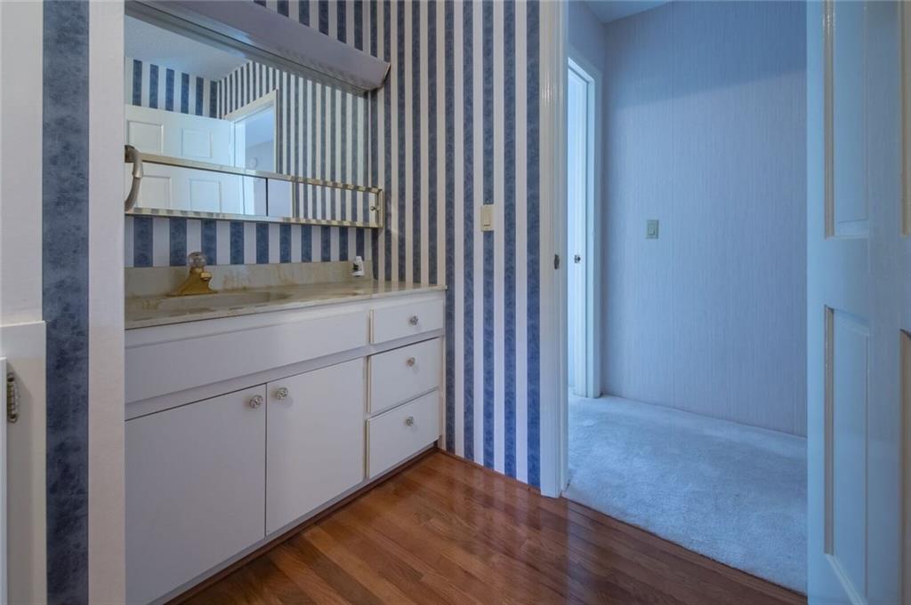 288 Rockledge Road Spruce Pine, NC 28777 - Photo 18 of 27 a view of a hallway with entryway wooden floor and cabinet