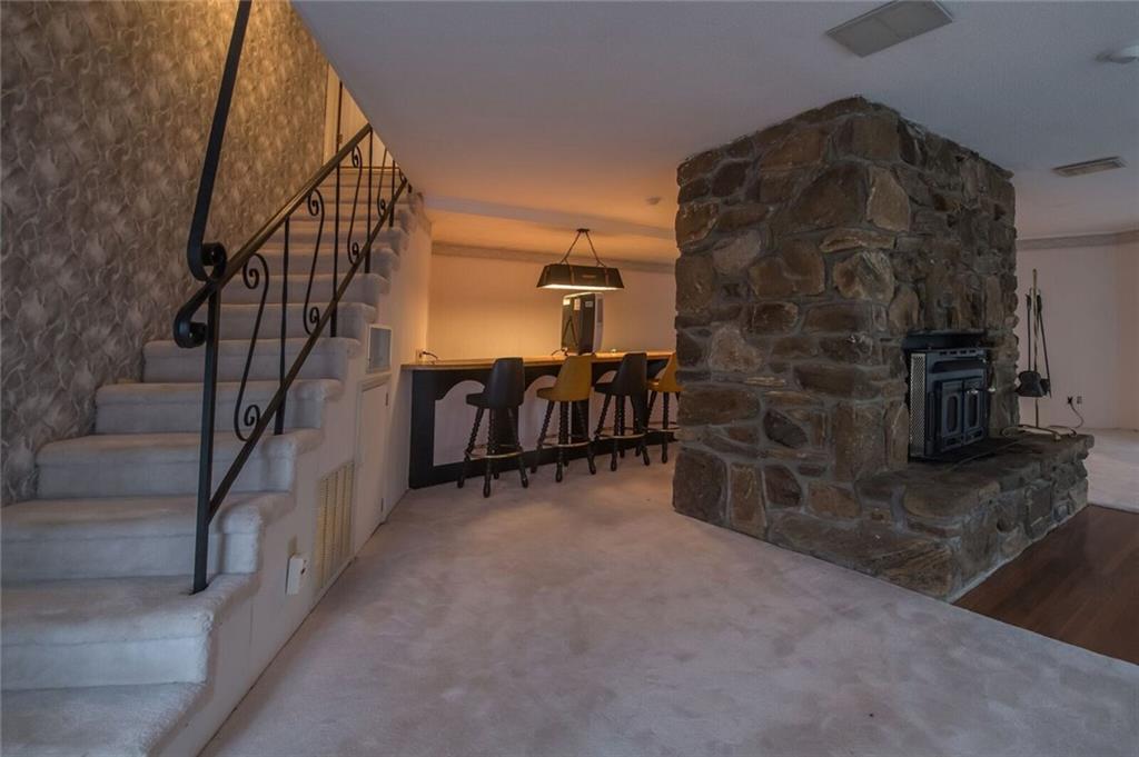 288 Rockledge Road Spruce Pine, NC 28777 - Photo 20 of 27 a view of livingroom with furniture and stairs