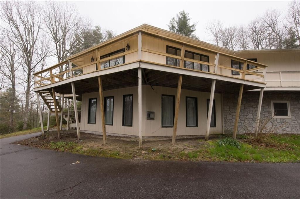 288 Rockledge Road Spruce Pine, NC 28777 - Photo 24 of 27 a front view of a house with a porch