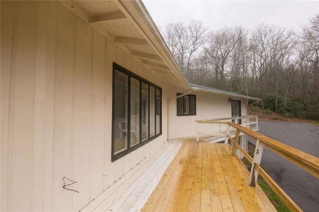 288 Rockledge Road Spruce Pine, NC 28777 - Photo 26 of 27 a view of a house with pool and wooden floor