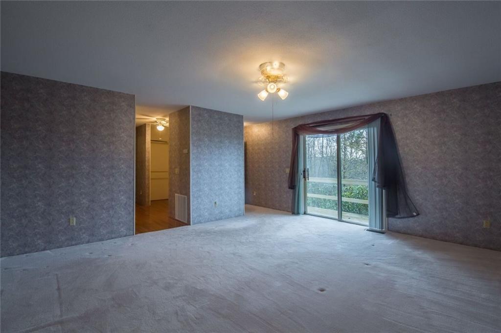 288 Rockledge Road Spruce Pine, NC 28777 - Photo 7 of 27 a view of an empty room with a window