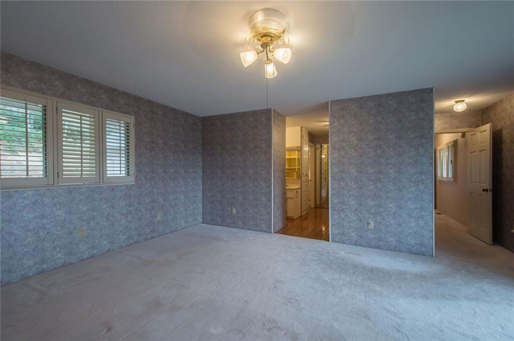 288 Rockledge Road Spruce Pine, NC 28777 - Photo 8 of 27 a view of empty room with a fan