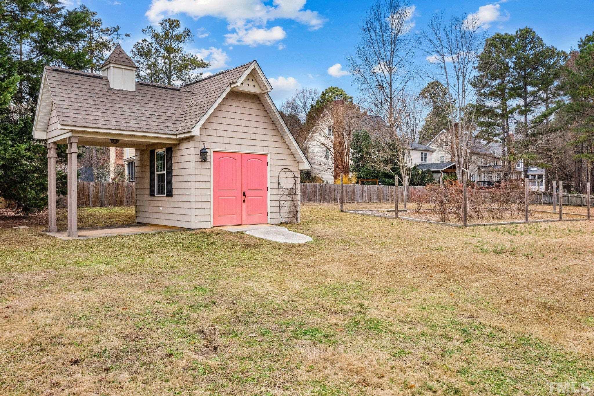 1613 Jenks Carpenter Road Cary, NC 27519 - Photo 17 of 60 a view of backyard of house