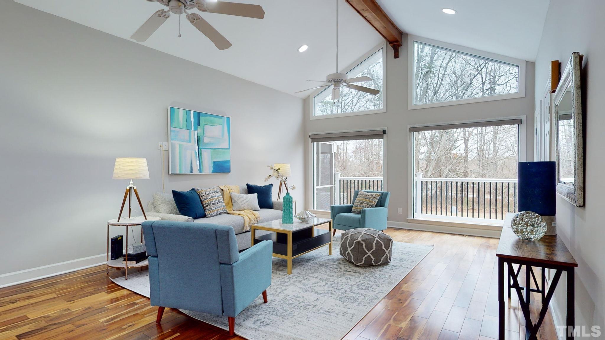 1613 Jenks Carpenter Road Cary, NC 27519 - Photo 25 of 60 a living room with furniture and a large window